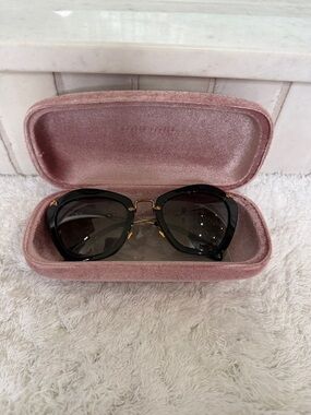 Black Cat-Eye Sunglasses with Gold Accents - Women's Accessories Miu Miu